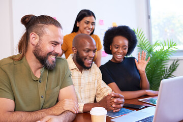 Four young members of tech start up join video call, group meeting, smiling