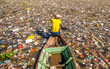 © Sony Herdiana - People collect trash that can be recycled and traded from the sea of garbage in the Citarum River, the one of polluted river in Bandung, West Java, Indonesia