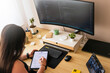 © Alfonso Soler - Computer Programmer Woman. Digital Workstation: Dedicated Female Programmer Flourishing in Remote Setup