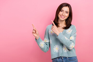 Poster - Photo of shiny pretty woman dressed teal outfit pointing two fingers empty space isolated pink color background