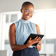© K.A./peopleimages.com - Smile, business tablet and black woman, designer or creative in office online. Touchscreen, technology and African female professional on email app, design research or website, internet or reading.