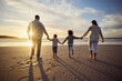 © Clement C/peopleimages.com - Sunset, beach and back of family holding hands and walking on holiday, summer vacation and weekend. Nature, travel and mother, father and children by ocean for bonding, adventure and quality time
