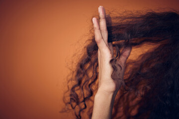 Canvas Print - Mockup, closeup and woman with hair care, fingers and salon treatment for volume, texture and grooming. Zoom, female person and model with scalp massage, curls and beauty against a studio background