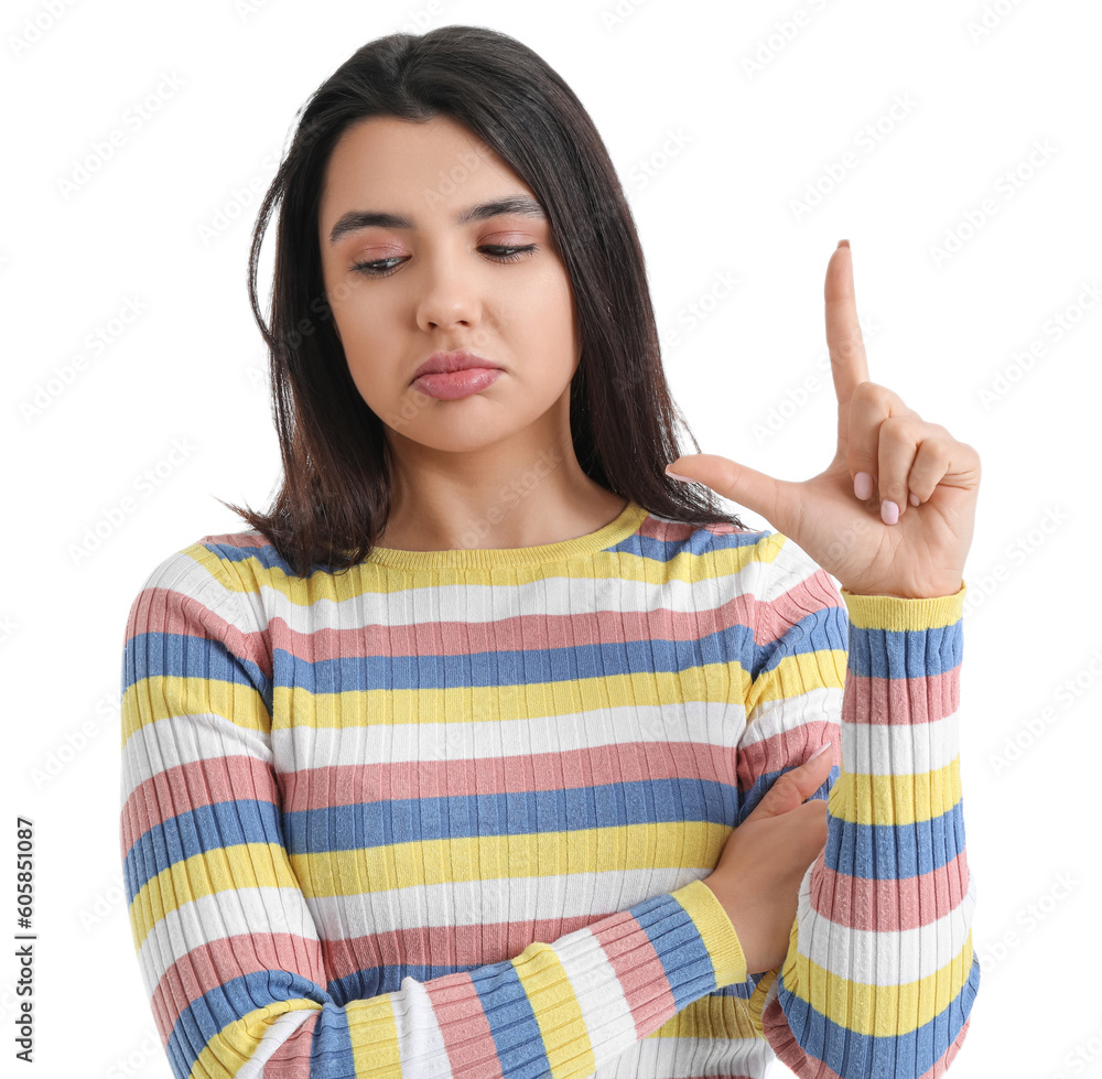Upset young woman showing loser gesture on white background, closeup