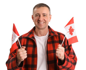 Canvas Print - Mature man with flags of Canada on white background