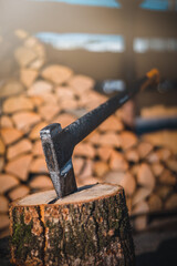 Wall Mural - Axe cut in the chopping block in wood background. Lumber jacks wood cutting work tool.