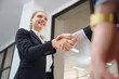 © เลิศลักษณ์ ทิพชัย - ฺPortrait of Business woman shaking hands with manager After signing contracts and in the office Handshake of successful business people