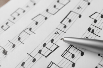 Canvas Print - Sheet with musical notes and pen, closeup view