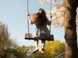© John - A young girl on a swing