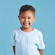 © Siphosethu F/peopleimages.com - Happy, portrait and a child with a smile for dental care isolated on a blue background in a studio. Smile, kindergarten and a little boy kid smiling with happiness about young oral hygiene results