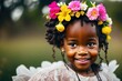 © Pictures Paradise - Portrait of beautiful African American girl with crowns offlowers smiling and looking at camera. Wearing wreath of flowers