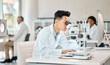 © Oostendorp/peopleimages.com - Investigation, science and microscope with an asian man doctor working in a lab for research or innovation. Healthcare, medical and experiment with a male scientist in a laboratory for analysis