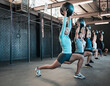 © Haas/peopleimages.com - Fitness, group and medicine ball for lunges exercise at a gym with diversity, energy and motivation. Strong men and women friends or people together for a sports class, training and wellness workout