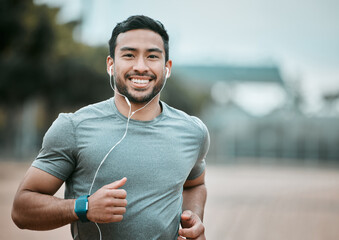 fitness, portrait and man running with earphones for music, radio or sport podcast for motivation. s