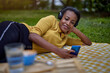 © kerkezz - a beautiful young woman with headphones in the park