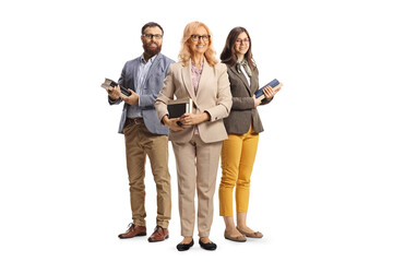 Canvas Print - Team of teachers holding books and posing