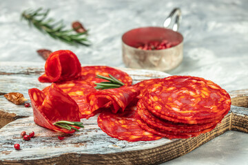 Wall Mural - Sliced chorizo salami sausage. spanish tapas, Food recipe background. Close up