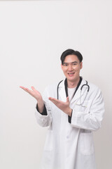 Portrait of male confident doctor over white background studio, healthcare and Medical technology concept.