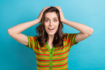 Poster - Closeup portrait of funny girl brown curls hands head speechless staring you look like lottery winner isolated on blue color background