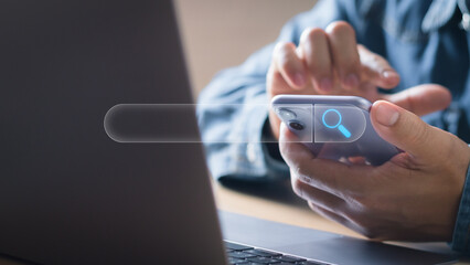 technology search engine optimization (SEO) and online marketing concept , men use mobile phones to search for customer information or find a job on internet sites displayed with  search bar.