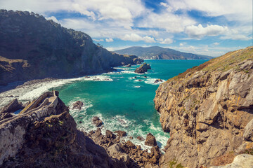 Wall Mural - Panoramic view of the rocky coast. Gaztelugatxe, Bermeo, Basque Country, Spain, Europe