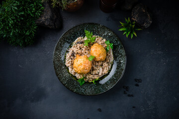 Canvas Print - Dinner chicken meatballs with barley porridge, mushrooms, sauce and herbs.