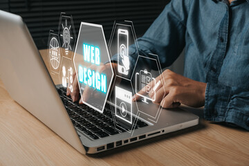 Wall Mural - web design concept, person using laptop computer with web design icon on virtual screen.