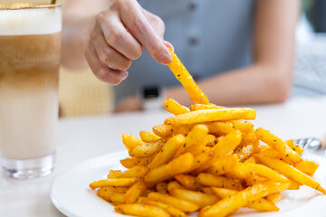 Poster - French fries with cheese in restaurant