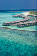 © icemanphotos - Maldives paradise island. Tropical aerial landscape, seascape, water villas bungalows with amazing sea and lagoon beach, tropical nature wave breaker. Exotic tourism destination banner summer vacation
