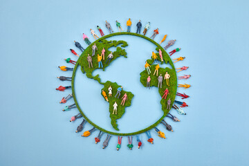 World Population Day, creative concept. Large and diverse group of people in the shape of the world map