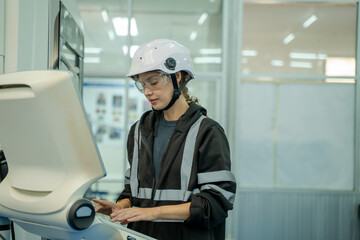 Poster - Engineer operating CNC computer machine working in industry factory.