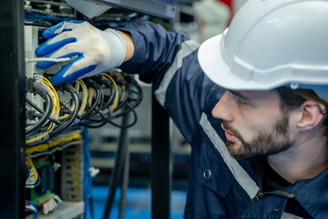 Aufkleber - Electricity and electrical maintenance service,Electrical engineers test electrical installations and wiring on protective relays, measuring them with a multimeter.