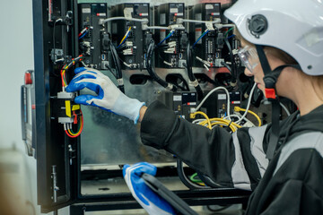 Aufkleber - Electricity and electrical maintenance service,Electrical engineers test electrical installations and wiring on protective relays, measuring them with a multimeter.