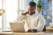 © N Lawrenson/peopleimages.com - African business man, neck pain and laptop with burnout, stress and muscle injury at desk in web design job. Developer, black businessman and entrepreneur with computer with fatigue in modern office
