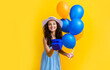 © be free - happy birthday woman with gift balloons isolated on yellow. birthday woman