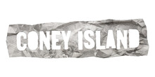 Coney Island Name Cut Out Of Crumpled Newspaper In Retro Stencil Style Isolated On Transparent Background