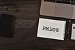 There is notebook with the word PMBOK. It is as an eye-catching image.