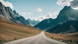 Fototapeta Uliczki - A Tasteful View Of A Road In The Mountains With A Sky Background