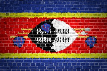 Poster - Shot of the Swaziland flag painted on a brick wall in an urban location