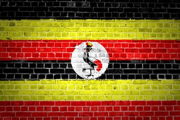 Poster - Shot of the Uganda flag painted on a brick wall in an urban location