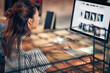 © luckybusiness - Young woman with coffee looking at computer, browsing on the internet.