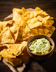 Canvas Print - Corn chips with avocado sauce.