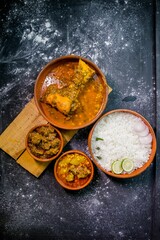 Sticker - Top view of white rice with lime and other meals on a wooden board on the kitchen table