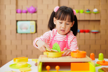 Sticker - young girl pretend playing food preparing at home