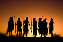Silhouettes Of African Aborigines At Sunset. Female Tribe Members In Desert Landscape. Created With Generative AI
