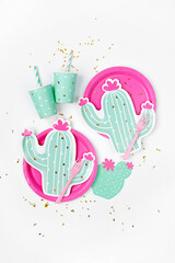 Wall Mural - Cute paper party plates in the shape of cactus with cups for themed party. Hawaiian Birthday party decorations. Set of holiday disposable tableware for party or picnic. Aloha Party Kits.