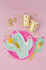 Wall Mural - Cute paper party plates in the shape of cactus with cups for themed party. Hawaiian Birthday party decorations. Set of holiday disposable tableware for party or picnic. Aloha Party Kits.