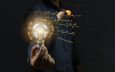 Scientist holding a light bulb and surrounding it with physics or mathematical equations showing ideas for solving problems or developing new things. innovation concept.