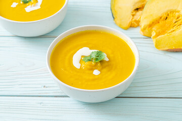 Canvas Print - pumpkin soup in white bowl