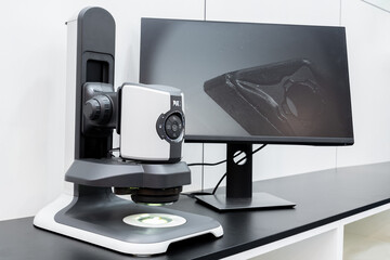 Leinwandbilder - Optic machine for precise measurement of part size and quality evaluation. Smart factory.	